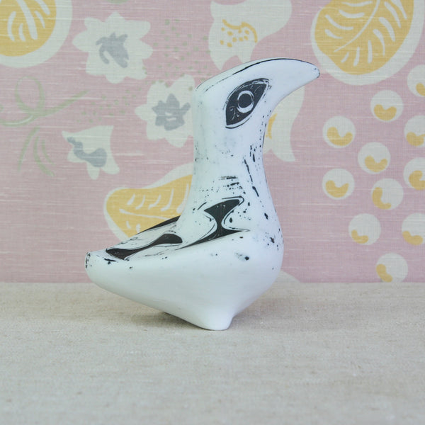 A large white ceramic bird figurine with black painted details. Post-war ceramic sculpture by Susan Parkinson. The Large Bird is a rare piece by the short lived Richard Parkinson pottery.