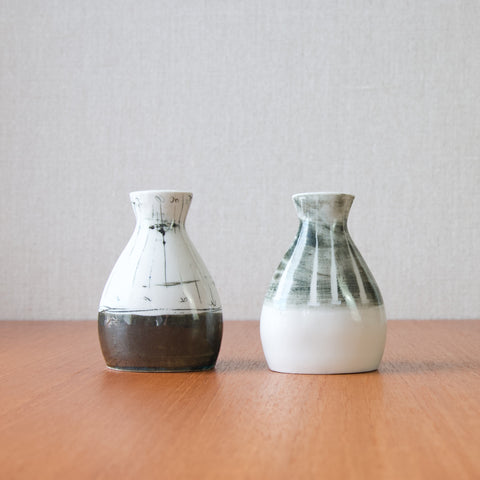 Indulge in the abstract sophistication of this Richard & Susan Parkinson porcelain cruet, a fusion of artistry and functionality, perfect for any home and modernist design lover.