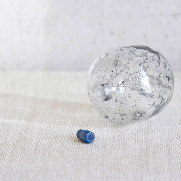 Detail of stopper to an Orrefors 1968 Expo glass bottle by Ingeborg Lundin with organic Modernism texture.