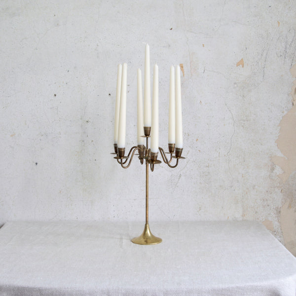 Mid-century Swedish brass seven-armed candelabra, 1950s. Functional and decorative Nordic design at its best.