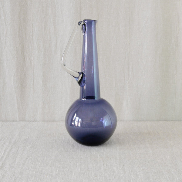 Tamara Aladin 1749 geometric glass carafe, combining a sphere, cone and triangular handle in a striking sculptural composition.