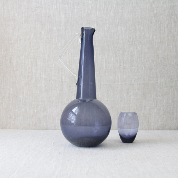 Tamara Aladin 1749 carafe or pitcher with Helena Tynell Pingviini glass, Riihimaki Finland modernist glass designs, handmade from purple glass.
