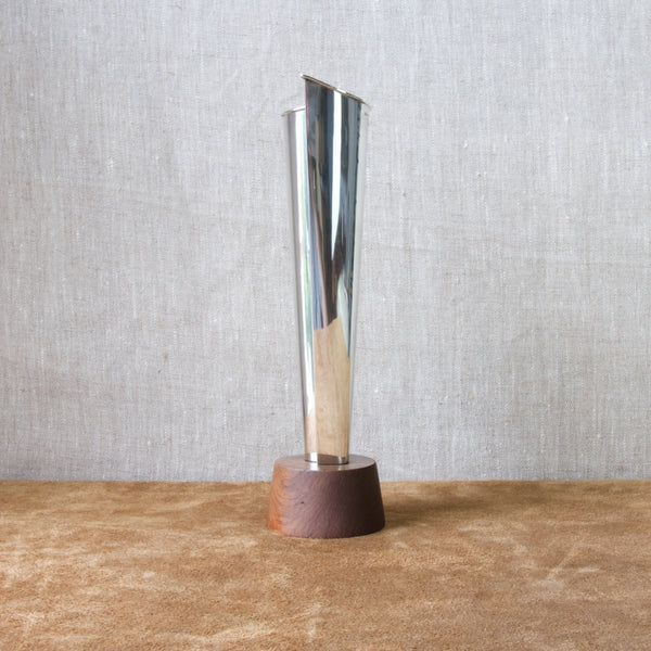 Head on shot of the side of a 26cm tall silver vase designed by Tapio Wirkkala for Kultakeskus Oy. This great examples of Finnish Modernism and many more available to view and buy in South West London at Art & Utility.