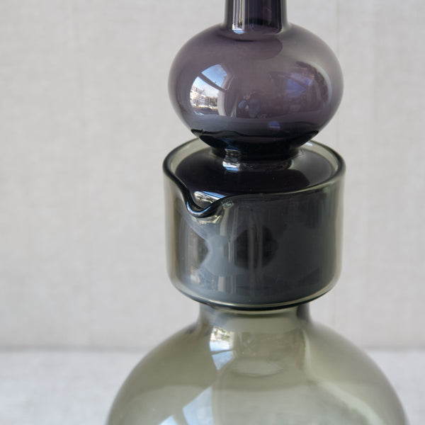 Detail of the pouring lip or spout of a 'Kremlin Kellot' or 'Kremlin Bells' decanter by leading Scandinavian designer Kaj Franck for Nuutajärvi Notsjö. This is a rare piece of Finnish glass.