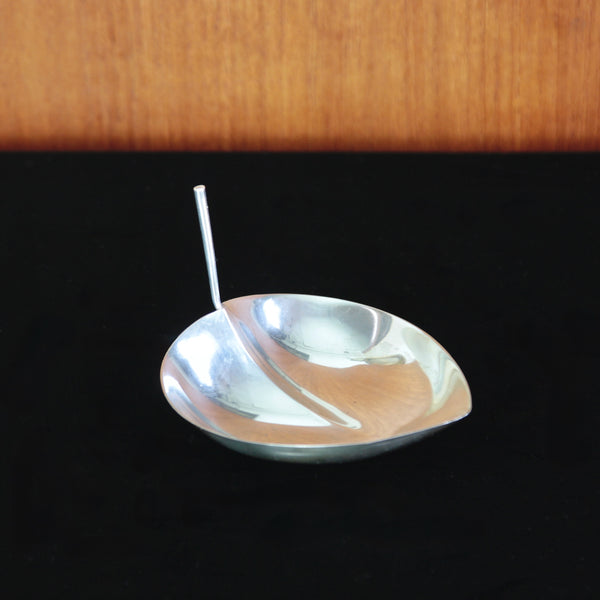 Top down view looking into the bowl of an elegant mid-century silver bon bon dish by Tapio Wirkkala, Art and Utility collection.