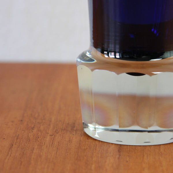 Unto Suominen glass vase for Nuutajärvi, combining a richly coloured hand-blown body with a brilliant clear crystal foot.