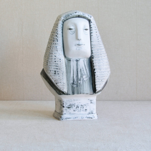 A large post-war Modernist studio pottery porcelain bust of a wigged 'Judge' designed and made by Susan Parkinson at  Richard Parkinson Pottery, circa 1953.