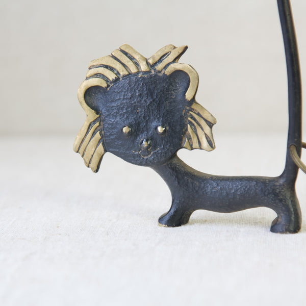 Modernist Lion pretzel holder with friendly face, designed by Walter Bosse and produced by the Herta Baller workshop, Vienna, Austria