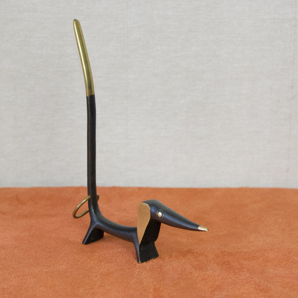 Mid Century Modern metal design from Austria, a dog pretzel holder by Walter Bosse, Baller