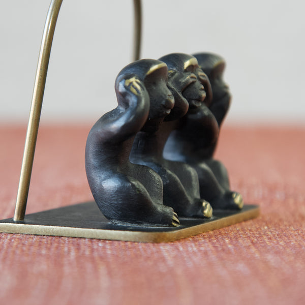 Close-up of Walter Bosse patinated brass 'hear no evil' monkey