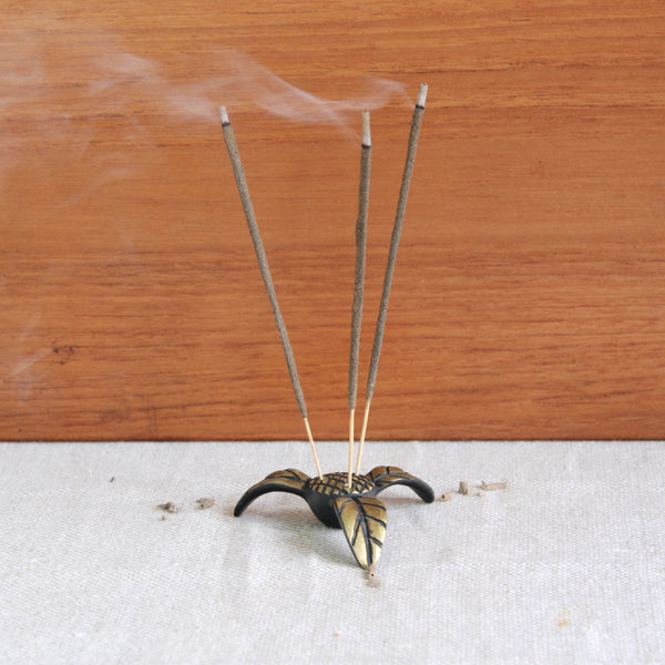 Walter Bosse exotic flower incense holder, rare mid-century brass collectible. Available in the UK from design gallery Art & Utility.