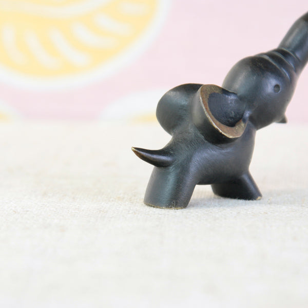 Vintage Austrian barware by Walter Bosse for Herta Baller, with a baby elephant forming the handle of the steel corkscrew.