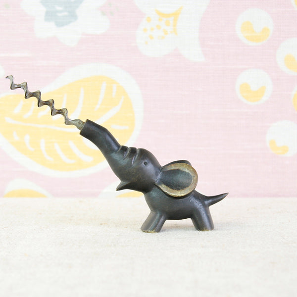 Baby elephant wine corkscrew by Walter Bosse for Baller Austria, made from solid sand-cast brass with a steel screw.