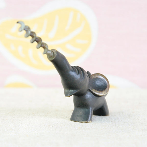 Walter Bosse elephant-shaped corkscrew, combining a small animal sculpture with a practical mid-century bar accessory.