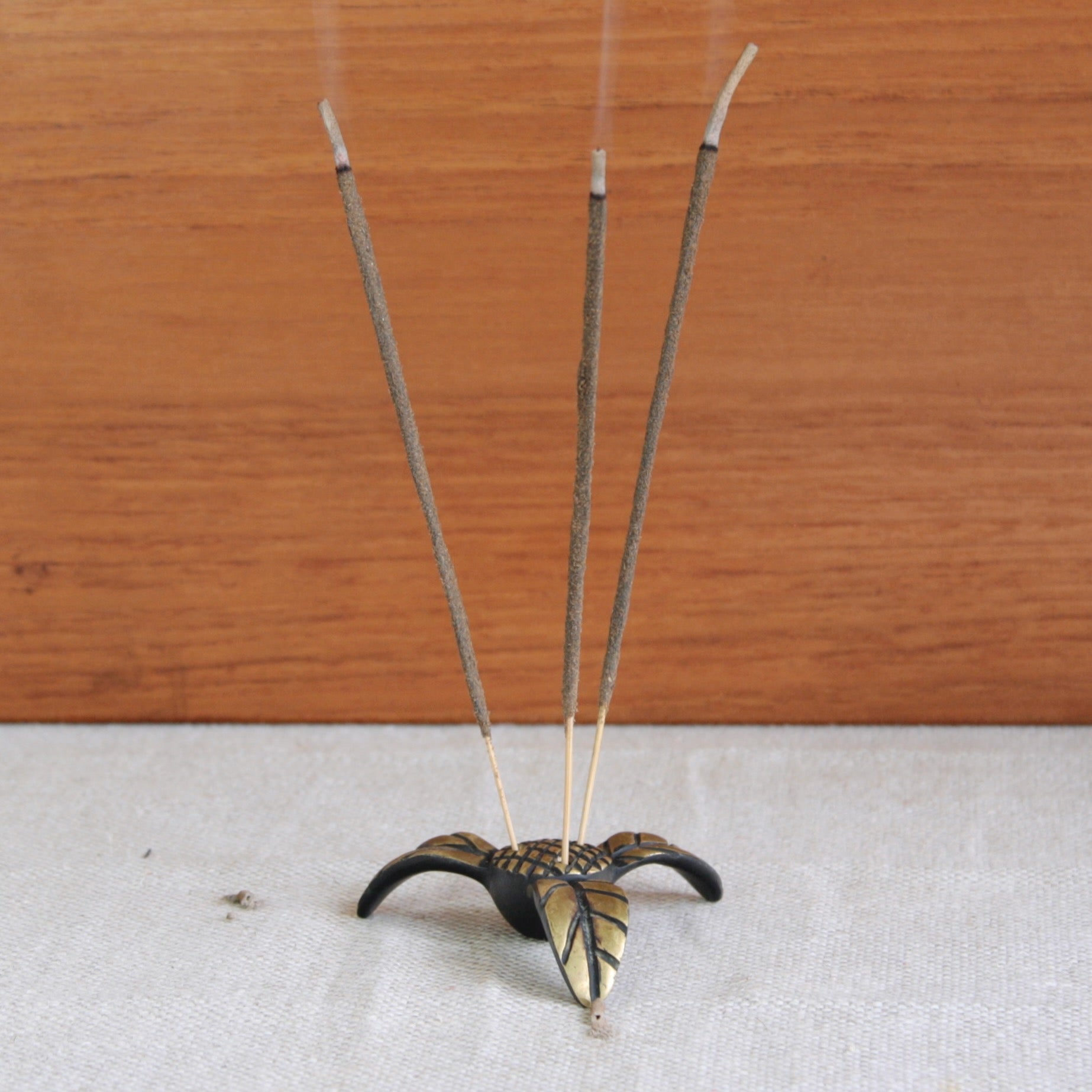 Brass palm tree incense holder by Walter Bosse, Vienna c.1950. For sale at UK design gallery Art & Utility, shipping worldwide.