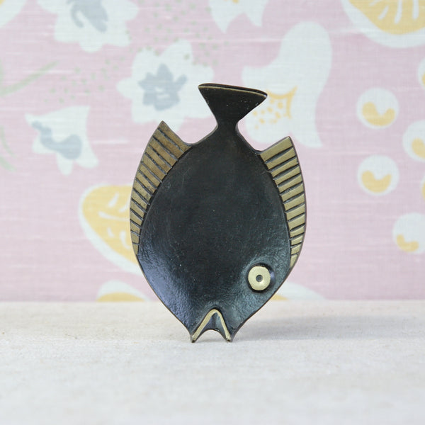 Sculptural fish dish by Walter Bosse, combining black patination with contrasting golden polished brass details.