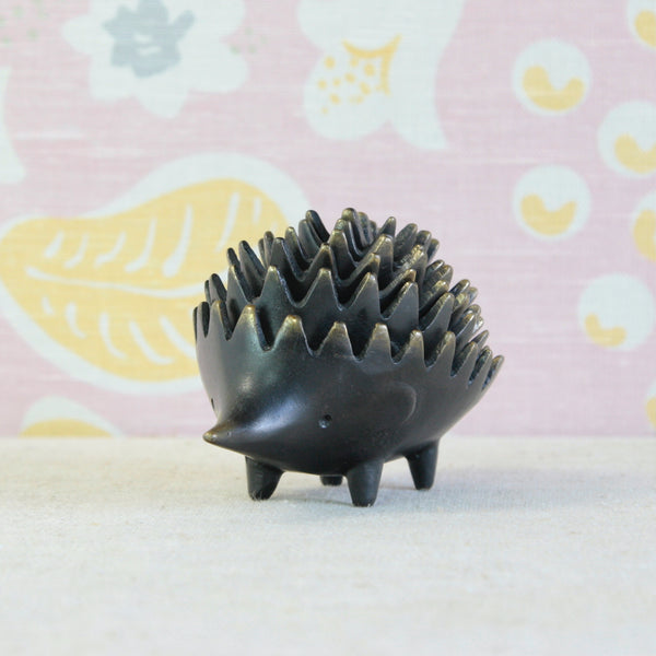 German-produced Walter Bosse hedgehog ashtray set from the 1950s, combining playful animal sculpture with ingenious functional design.