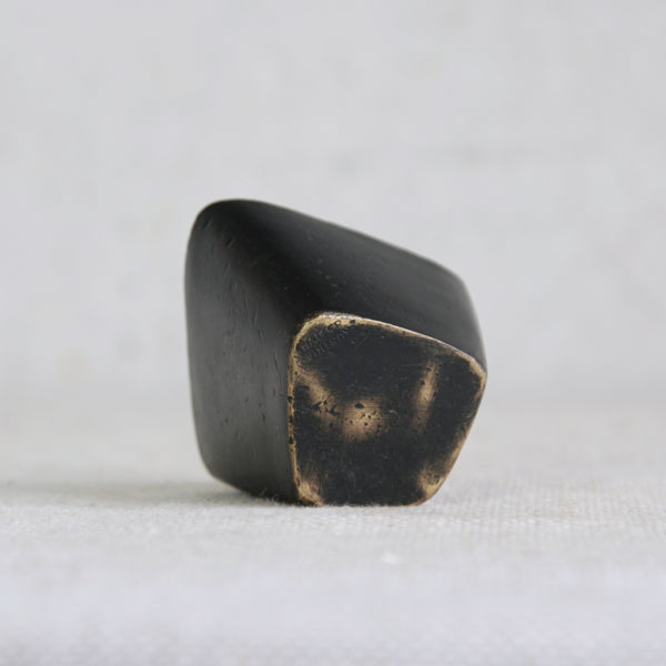 A sculptural mid-century Walter Bosse brass vessel with decorative patina, handmade in Vienna by Baller Austria, and showing mark "Baller Austria".