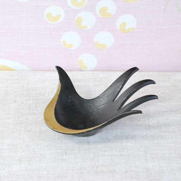 Walter Bosse Viennese brass hand ashtray, combining an elegant sculptural form with the designer's characteristic humour.