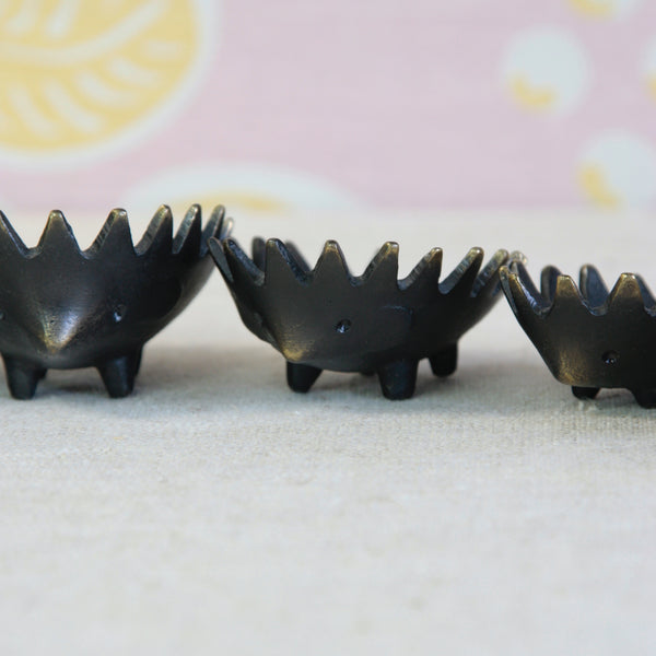 Close view of the famous Walter Bosse hedgehog ashtray design, combining a humorous animal form with practical mid-century design.