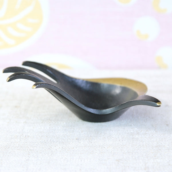 Elegant 1950s Walter Bosse hand ashtray, its elongated form evocative of the stylish fashion imagery of the mid-century period.