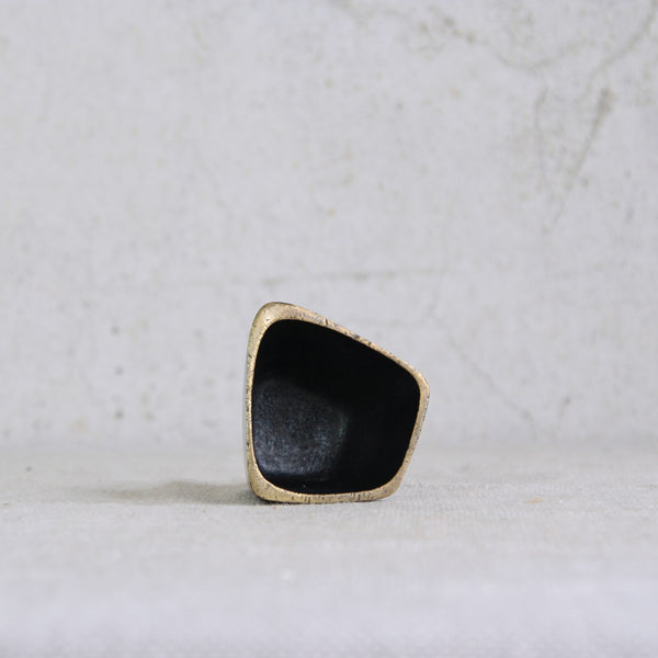 A 1950s Walter Bosse brass vessel, designed as a mortar or vide-poche, produced by Herta Baller in Vienna, Austria.