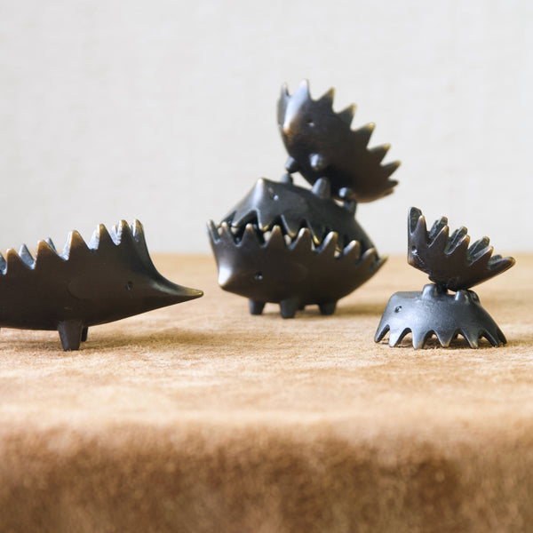 Family of Walter Bosse stacking hedgehogs playing