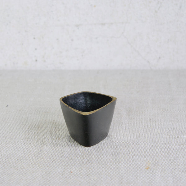 Mid-century modern Walter Bosse brass square vessel with decorative patina and polished brass highlights.