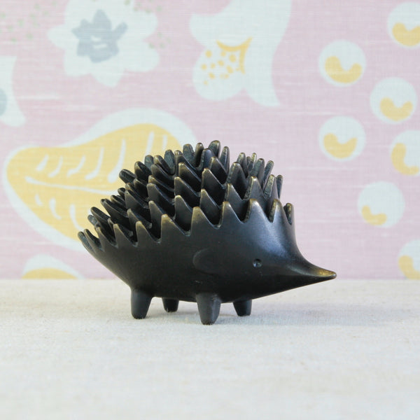Six Walter Bosse hedgehog ashtrays arranged individually, illustrating the sociable function behind this ingenious 1950s design.