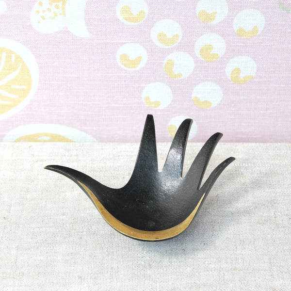 Modernist hand-shaped ashtray designed by Walter Bosse and produced by the Herta Baller workshop in 1950s Vienna.