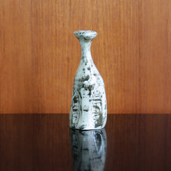 Gloss-glaze porcelain cat sculpture by Susan Parkinson, inspired by Nicolas Vergette, collectible and elegant.