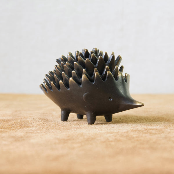 Mid Century Modern stacking hedgehog ashtrays designed by Walter Bosse, 1950's, handmade from patinated brass.