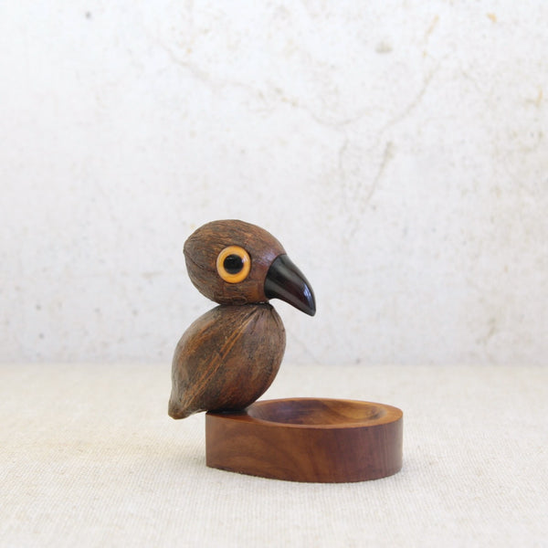 Art Deco YZ nut bird coin tray designed by Bernard Charles Howell for Henry Howell & Co., carved mahogany base with coquilla nut bird, circa 1925.