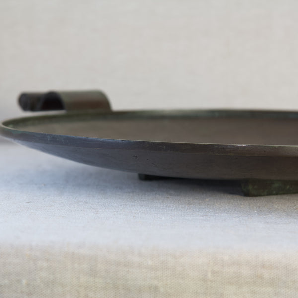 Detail of the edge of a bronze dish by Einar & Sune Bäckström. The high quality of craftspersonship is typical of Swedish Grace design from the 1930s.