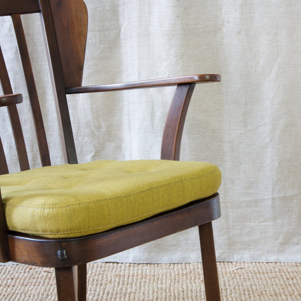 Christian E. Hansen 'Canada' armchair showcasing the enduring allure of midcentury Scandinavian design. Manufacture by Fritz Hansen.