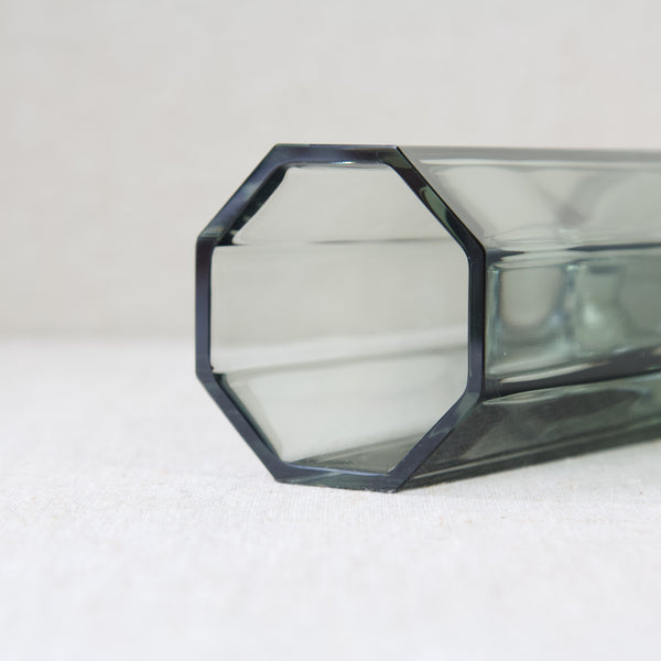 Detail showing the brilliantly facetted polished edges on an octagonal shaped glass vase by Kaj Franck. This Finnish art object is model KF298 and was created at Nuutajarvi Notsjo in the 1950s.