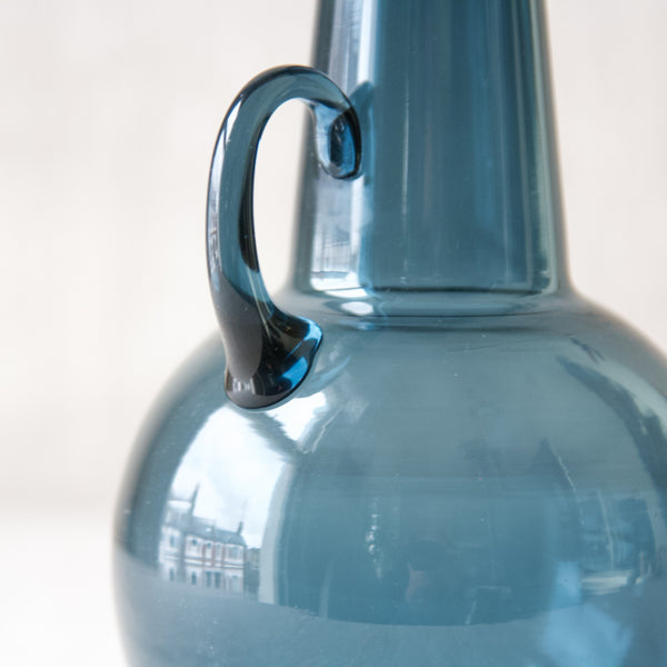 Detail of handle on modernist Finnish geometric glass carafe designed by Tamara Aladin, Riihimaki