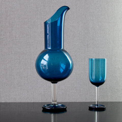 two pieces of blue Nanny Still Harlekiini glass, a wine carafe and wine glass