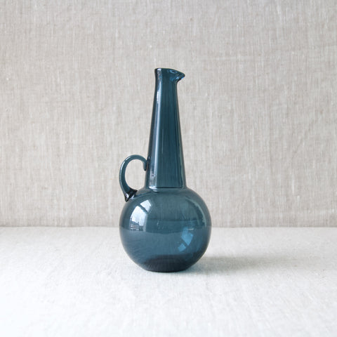 Steel blue glass carafe or decorative bottle, designed by Tamara Aladin for Riihimaen Lasi Oy, Finland, a good example of modernist Finnish glass design