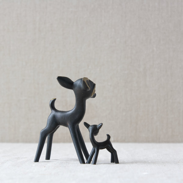 A pair of deer sculptures in bronze patinated brass, designed by Walter Bosse, 1950s