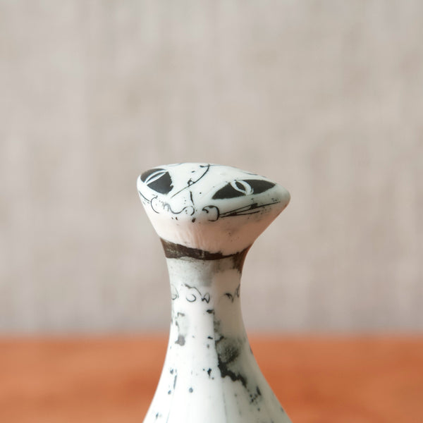 Detail of characterful face on modernist abstract British porcelain figurine by Susan Parkinson pottery, 1950s, Ashford, Kent, United Kingdom
