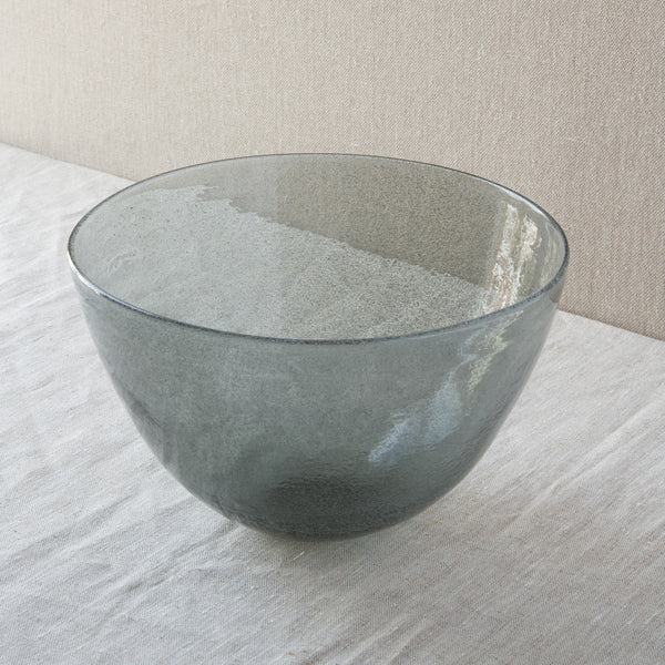 Mood image showing how different lights effect the 'Carborundum' glass used in this rare large bowl by Erik Höglund for Boda, Sweden.