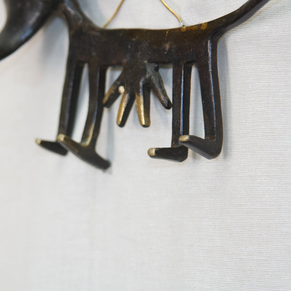 Detail of black Patinated brass key holder in the shape of a cow designed by Walter Bosse 1960s