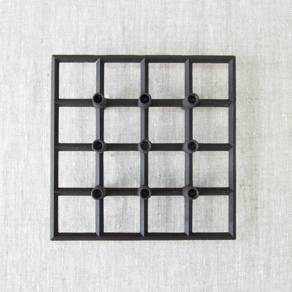 Cast iron metal grid candle holder by Jens Quistgaard