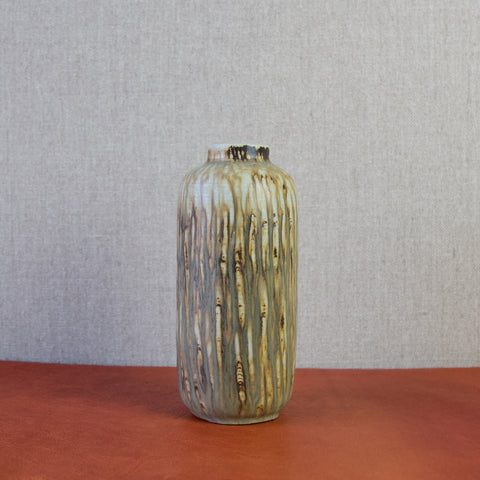 tall straight sided vase by gunnar nylund in natural sunlight
