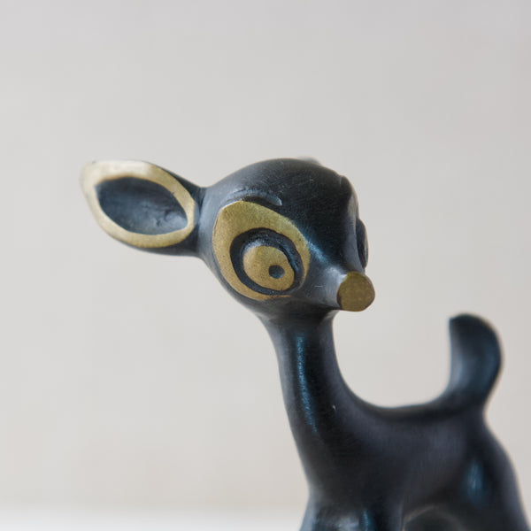 Close-up of face of 1950s modernist brass deer Bambi mother figure, produced at Baller Austria