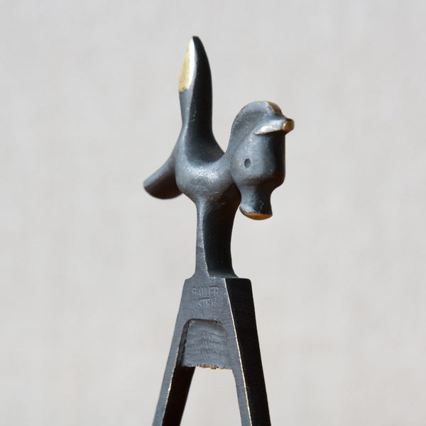 Sculptural foal or baby horse on a 1950s vintage patinated brass bottle opener designed by Walter Bosse for Baller Austria