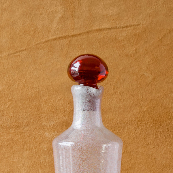 Detail of Tamara Aladin red glass stopper for 'Star' decanter with bubbles
