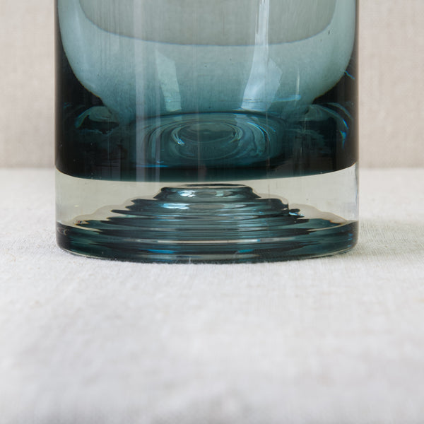 Head on shot showing the optical effect created by the ribs in a mould blown 'Paraati' (Parade) decanter bottle. Design by Nanny Still for Riihimaki glassworks, Finland.