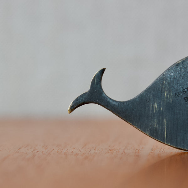 Tail of high quality Walter Bosse patinated brass bottle opener in the form of a fish, partly showing Herta Baller stamp